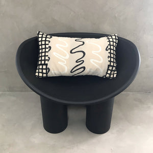 Lumbar Pillow Cover - Vintage African Mudcloth Fabric - Modern Squiggle Placed on a black chair